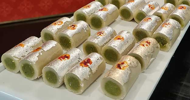 Chakkiwalle Kaju Pista Roll Or Cashew Pistachio Rolls Mithai , Indian sweet or dessert for festivals
