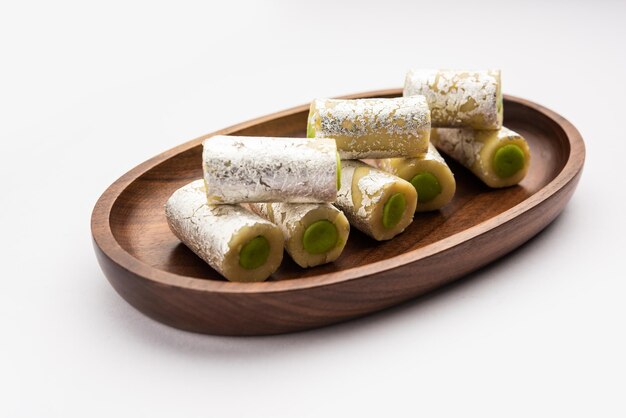 Chakkiwalle Kaju Pista Roll Or Cashew Pistachio Rolls Mithai , Indian sweet or dessert for festivals