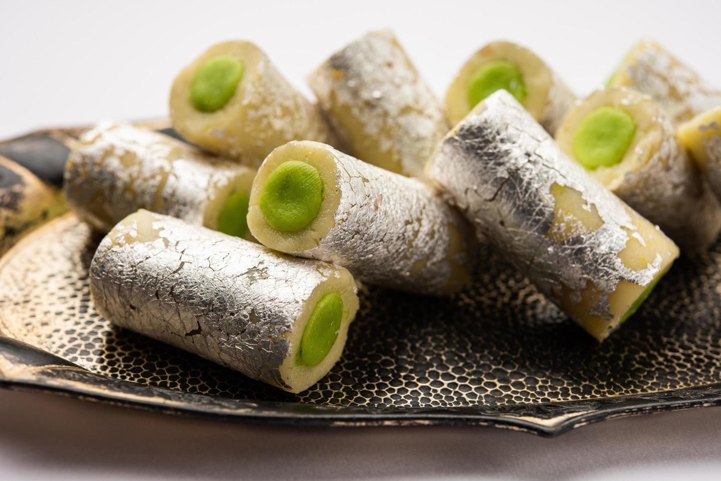 Chakkiwalle Kaju Pista Roll Or Cashew Pistachio Rolls Mithai , Indian sweet or dessert for festivals