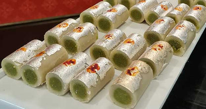 Chakkiwalle Kaju Pista Roll Or Cashew Pistachio Rolls Mithai , Indian sweet or dessert for festivals